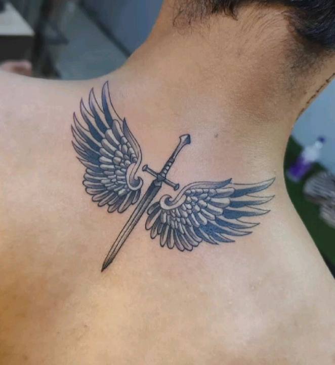 Sword with two feathered wings tattooed on the back of the neck and upper back