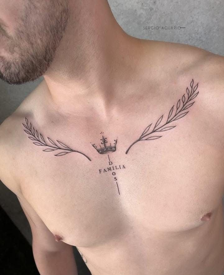 Black rose with a thorny stem and Roman numerals tattoo on a man’s shoulder and collarbone