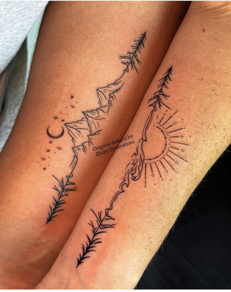 Matching forearm tattoos of a mountain ridge with moon and stars and a pine tree with a sun