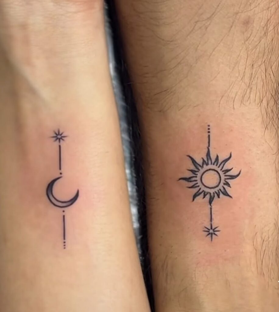 Close-up of matching minimalist crescent moon and sun wrist tattoos with a star and dotted line